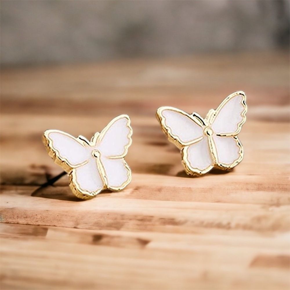 Tiny Petite beautiful pearl-colored butterfly earrings. - Picture 6 of 9